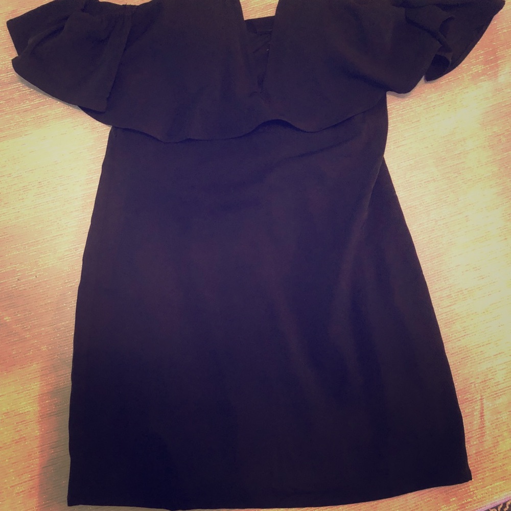 Sexy little black dress with off shoulder sleeves